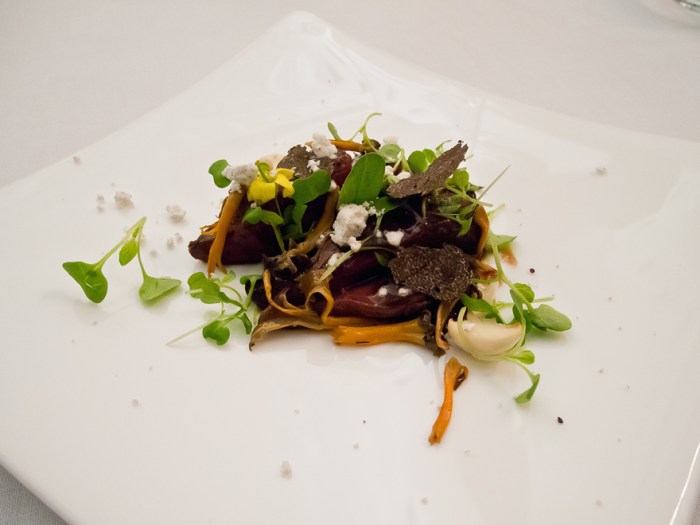 Araiz Bresse Pigeon roasted "a la minute" and served over truffled rice 